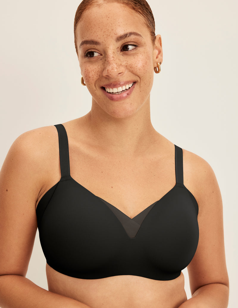 Front view of model wearing the Shape & Smooth Bra, highlighting the neckline, strap design, and smooth silhouette