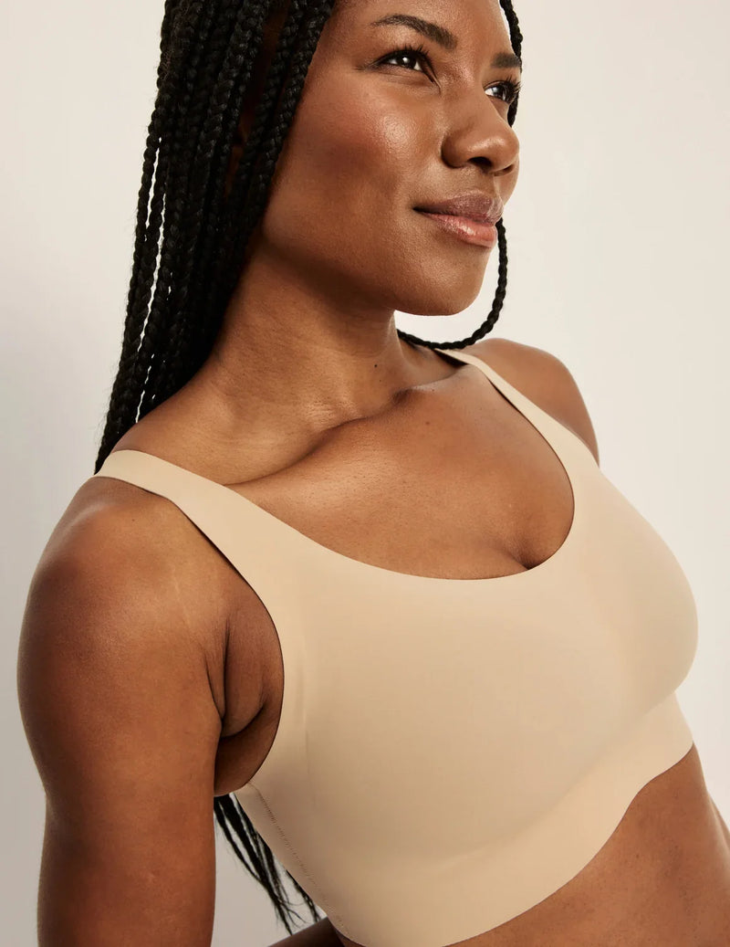 Gin is a 34DD and wearing KNIX M+ | Warm Sand