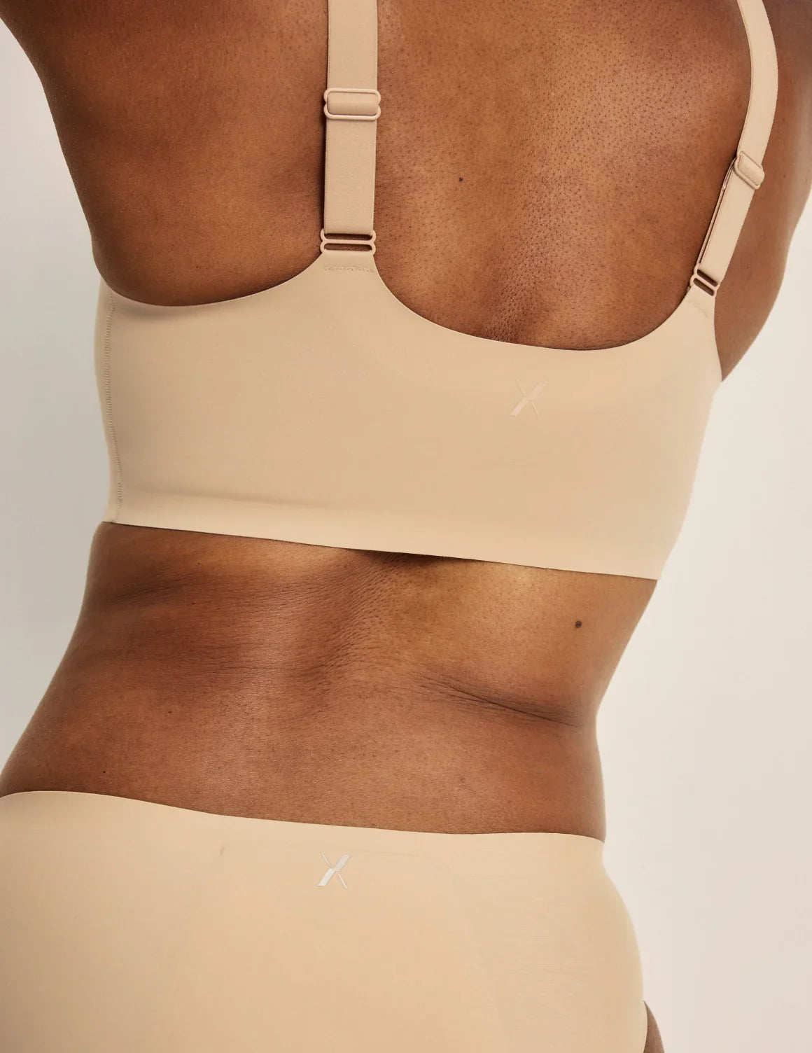 Gin is a 34DD and wearing KNIX M+  | Warm Sand