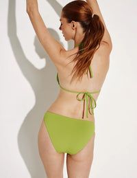 Molly has 35.5” hips and wears a Knix size S | Chartreuse
