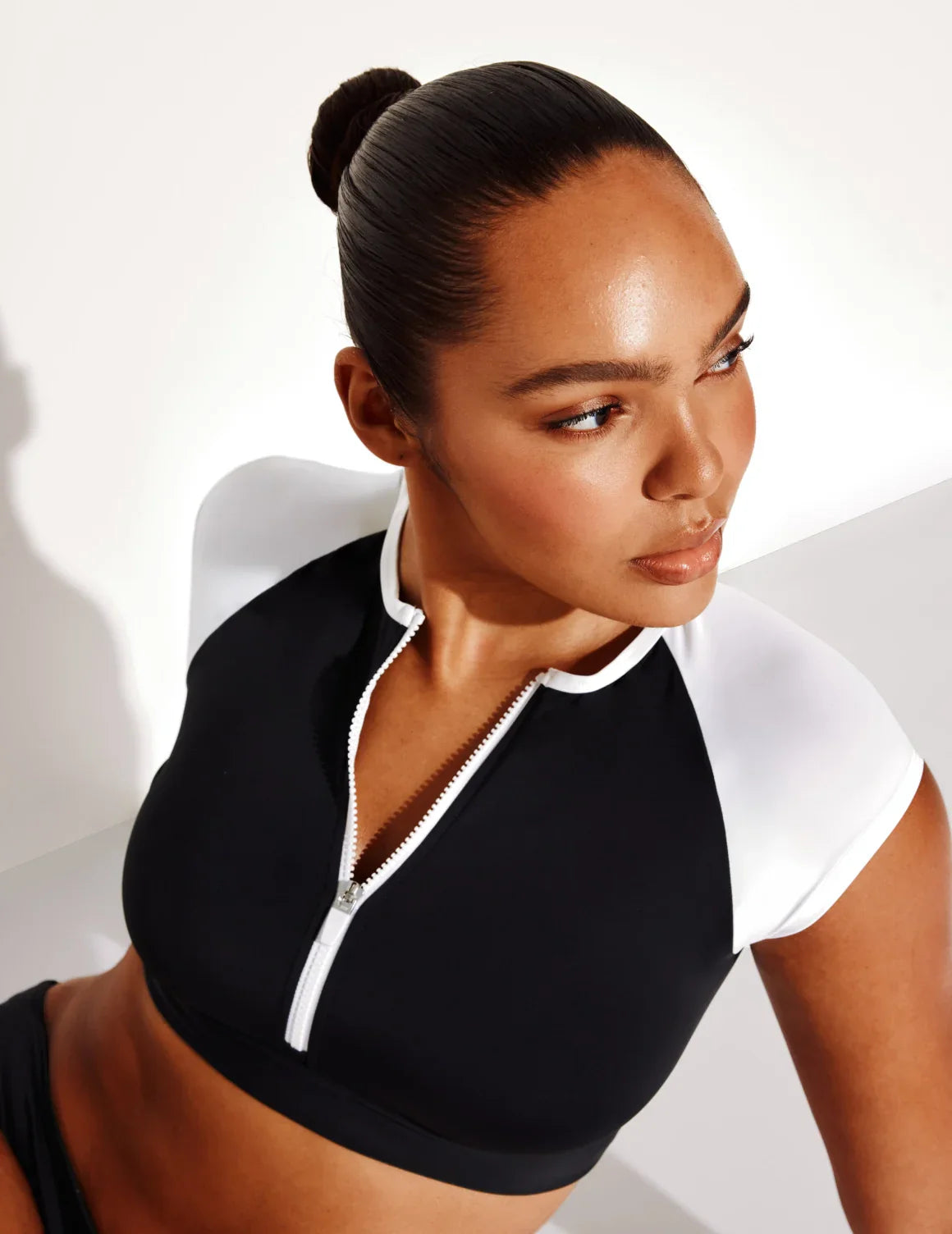 Amber is a 36C and wears a Knix size L | Black/White