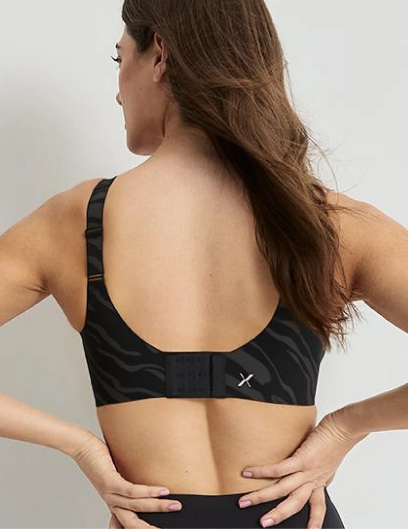 Sofia is a 32D wearing KNIX S+ | Zebra
