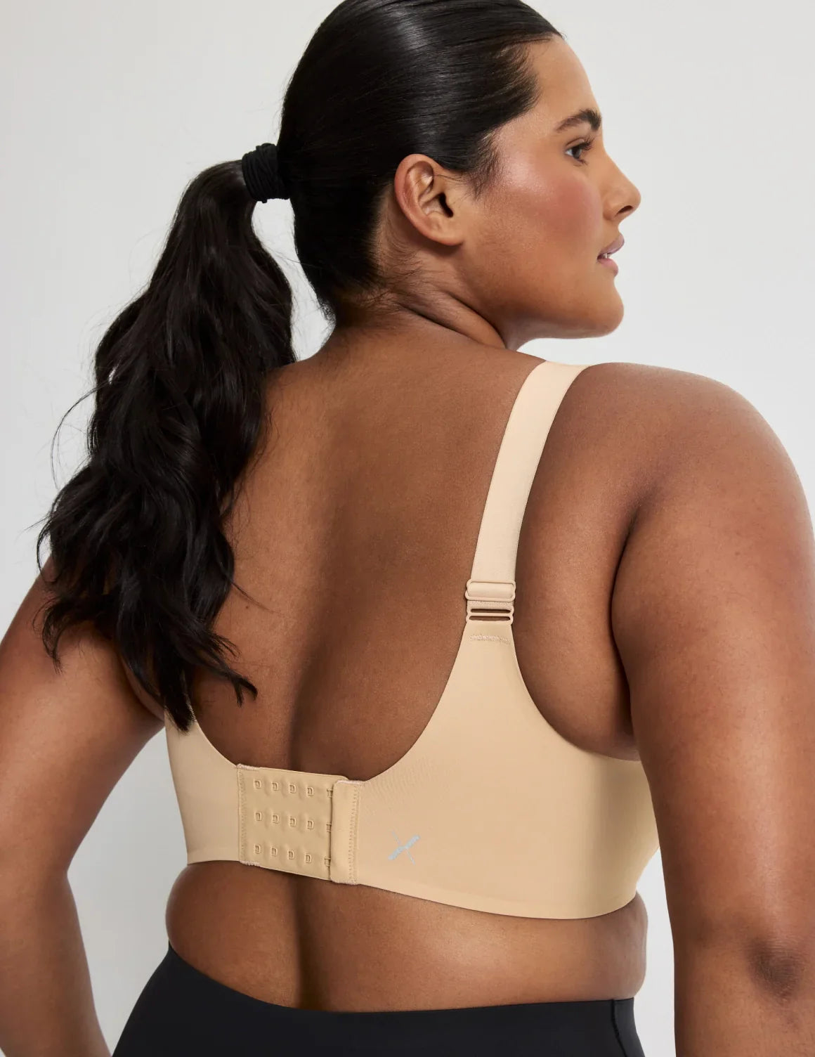 Adiya is a 36C and wears a Knix size L  | Warm Sand