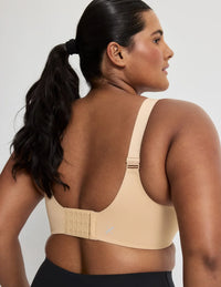 Adiya is a 36C and wears a Knix size L  | Warm Sand