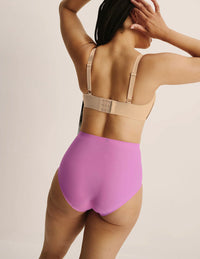 Abigail is wearing KNIX L | Pink Plum