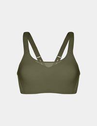 Adiya is a 36C and wears a Knix size L | Olive