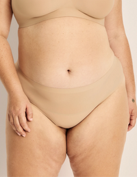 Clementine has 51” hips, and wearing KNIX XXL | Warm Sand