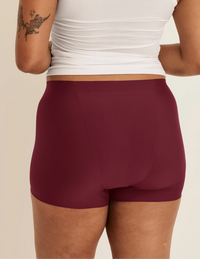 Back view of model wearing the SuperPlus Leakproof® Dream Short highlighting the coverage and smooth fit