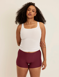Full-body view of model wearing the SuperPlus Leakproof® Dream Short highlighting the coverage and smooth fit