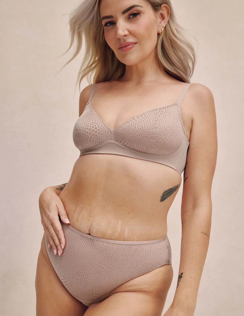 Front view of model highlighting the coverage and fit