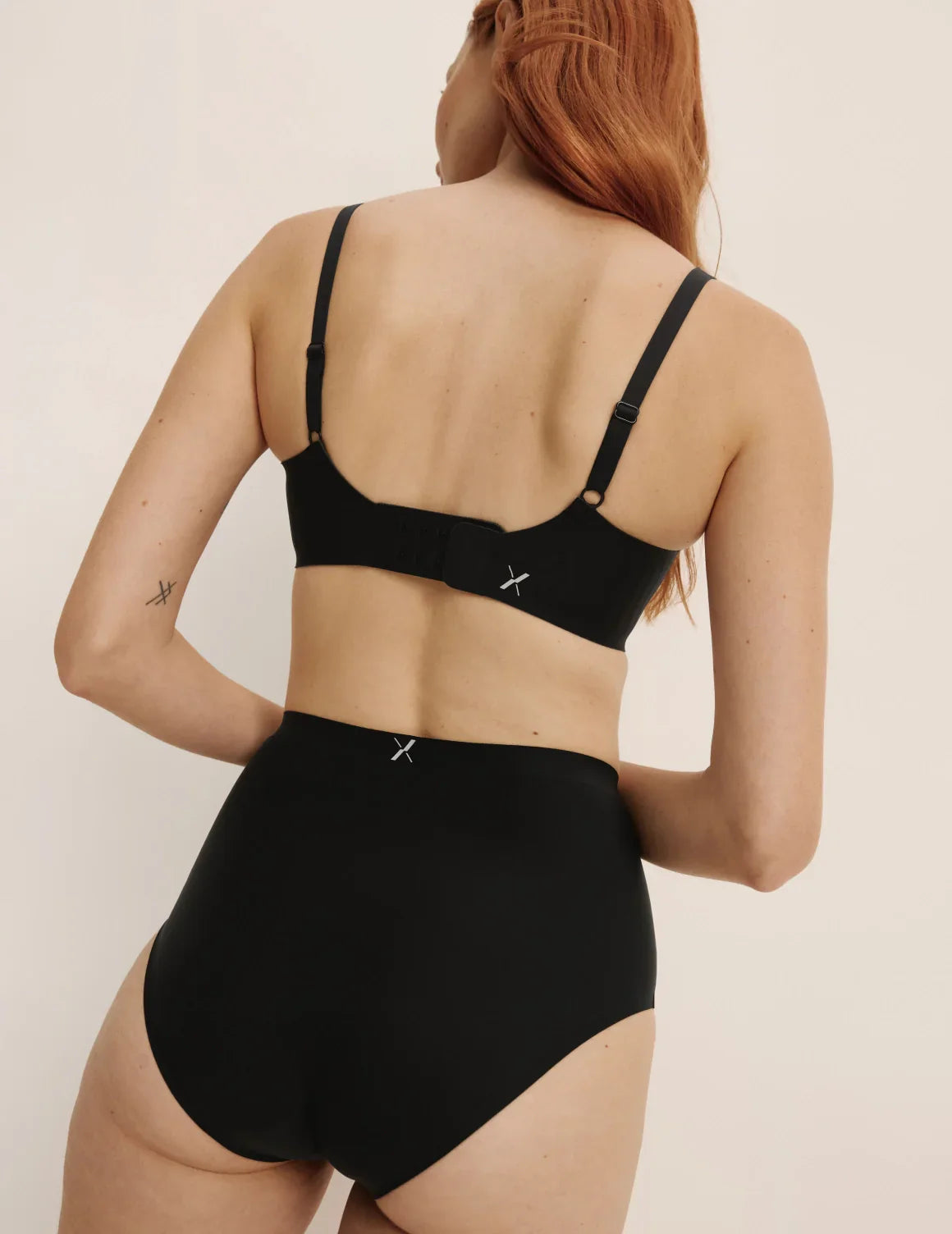 Molly has 35.5” hips, and wearing KNIX S | Black