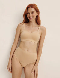 Molly has 35.5” hips, and wearing KNIX S | Warm Sand