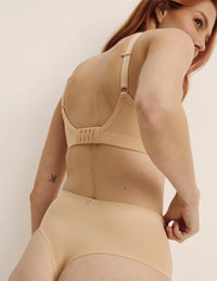 Molly has 35.5” hips, and wearing KNIX S | Warm Sand