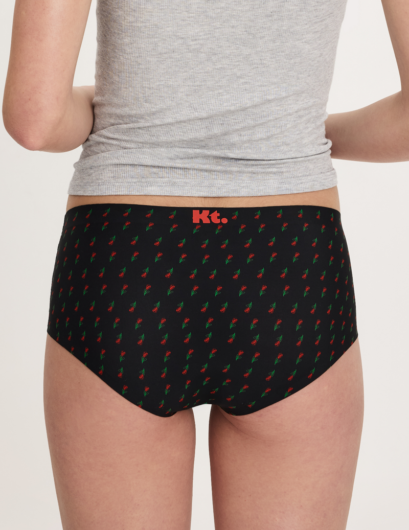 Back view of model wearing the Teen Light Leakproof No-Show Boyshort highlighting the coverage and smooth fit