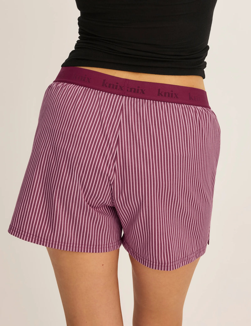 Back view of model wearing the Super Leakproof® Dream Boxer™ highlighting the coverage and fit