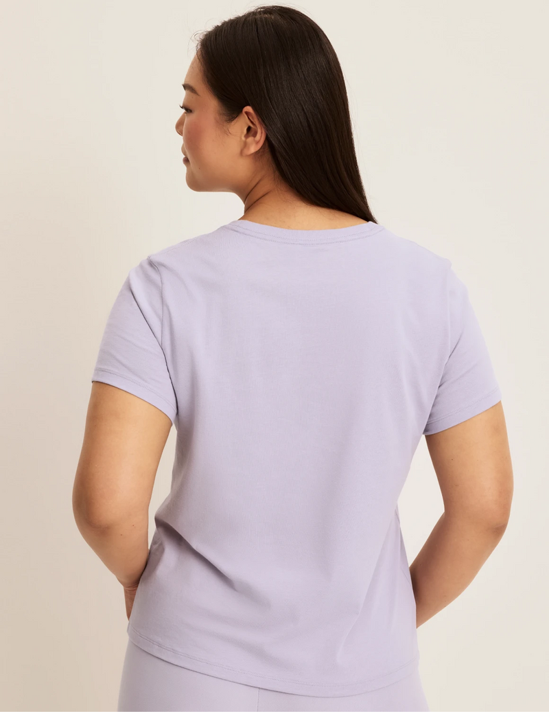 Back view of model wearing the Cotton Relaxed T-Shirt highlighting the coverage and fit