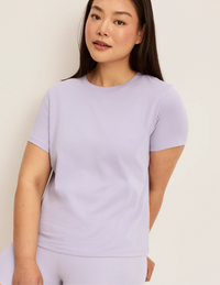 Front view of model wearing the Cotton Relaxed T-Shirt highlighting the coverage and fit