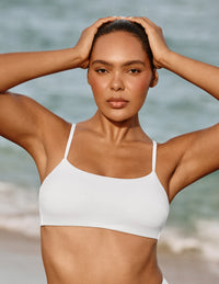 Front view of model wearing the Sculpt Square Neck Bikini Top, highlighting the neckline, strap design, and silhouette