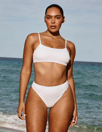 Full-body view of model wearing the Sculpt Square Neck Bikini Top, highlighting the neckline, strap design, and silhouette