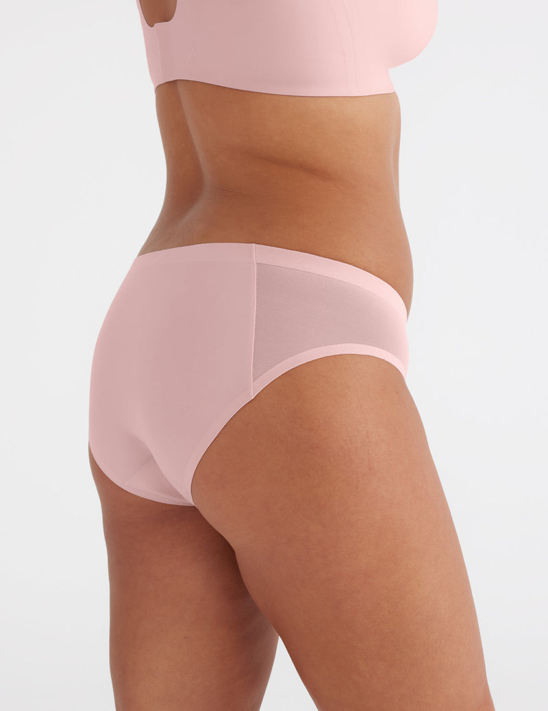 Front view of model highlighting the coverage and fit