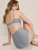 Esther has 38” hips and is wearing a Knix size M  | Glacier
