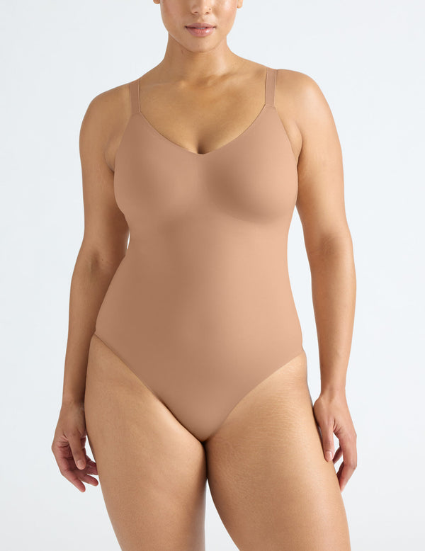 Alicia is a 36DD, has 44