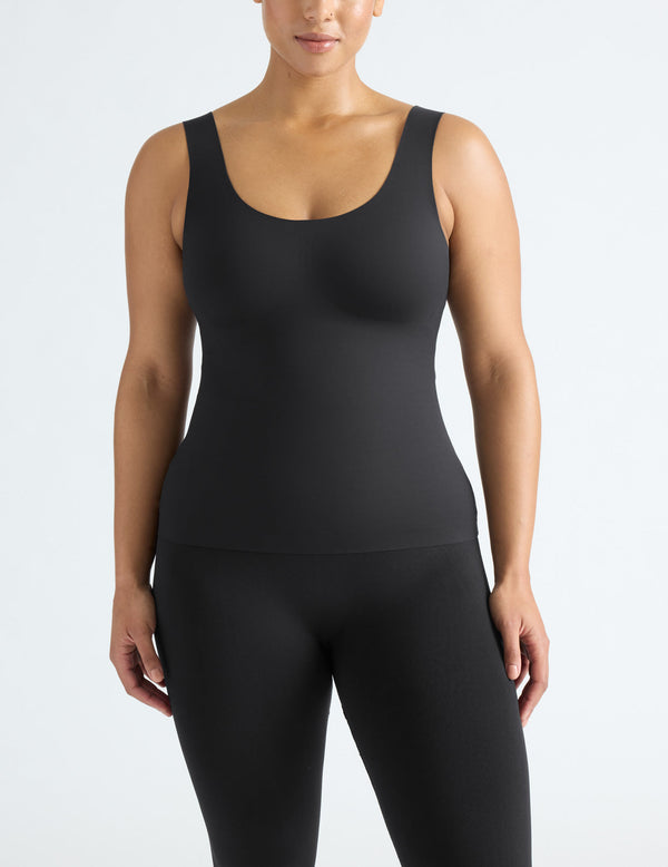 Alicia is a 36DD, has 44