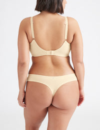 Maya is a 34F and wears a Knix size M++  | Dune