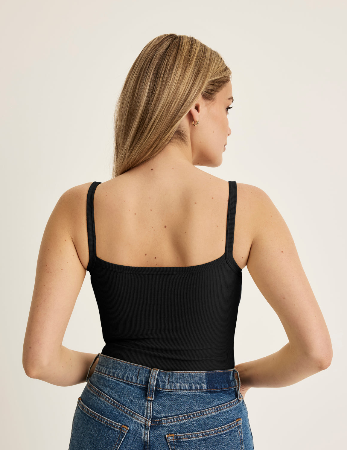 Sarah is a 34DD wearing KNIX M | Black