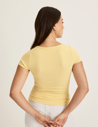 Alexandra is wearing KNIX S | Buttercup