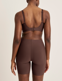 Back view of model wearing the Thigh Saver® 6” highlighting the coverage and smooth fit