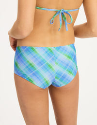 Back view of model wearing the Teen Period Swim Full Coverage Hipster highlighting the coverage and fit