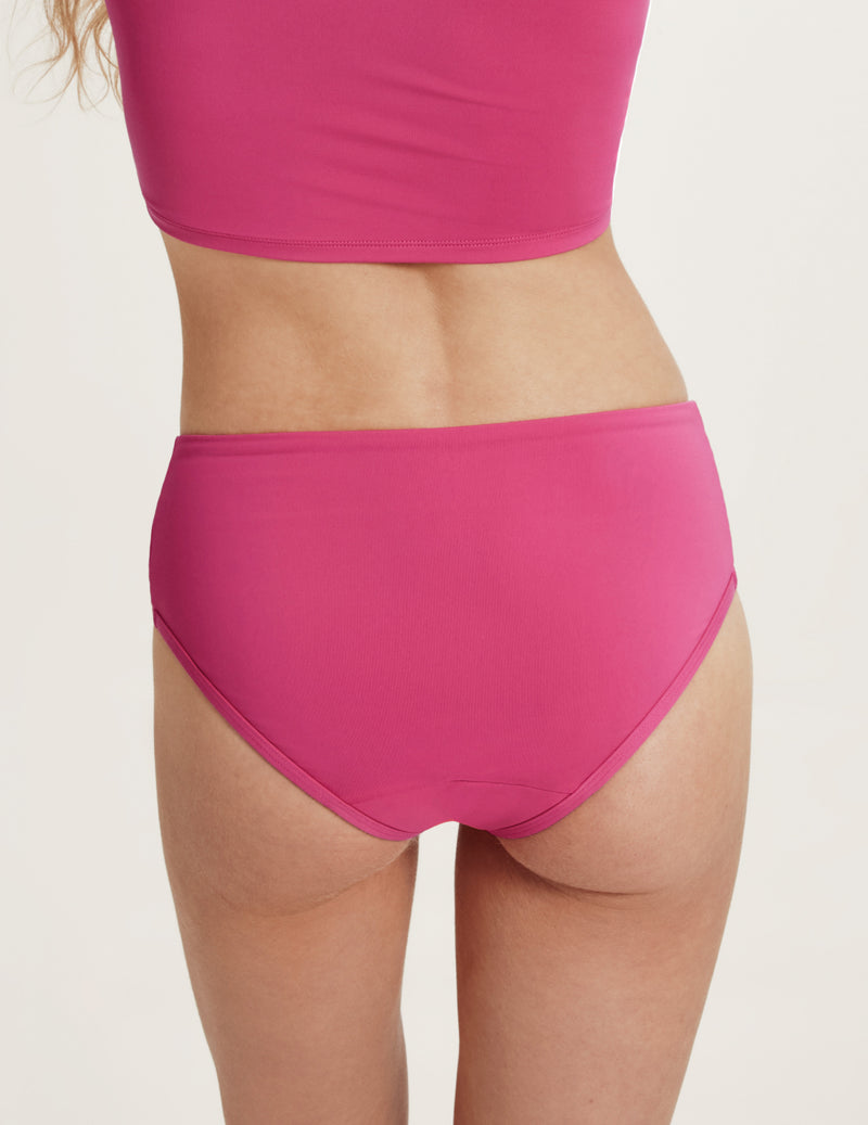 Back view of model wearing the Teen Period Swim Full-Coverage Bikini Bottom highlighting the coverage and fit