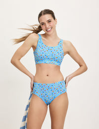 Front view of model wearing the Teen Period Swim Full-Coverage Bikini Bottom highlighting the coverage and fit