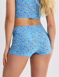 Back view of model wearing the Teen Period Swim Short highlighting the coverage and fit