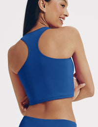 Back view of model wearing the Teen Racerback Tankini Swim Top highlighting the coverage and fit