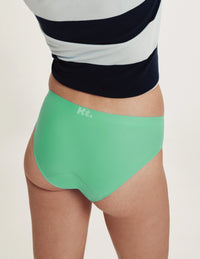 Back view of model wearing the Teen Super Leakproof® No-Show Bikini highlighting the coverage and smooth fit