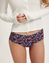 Front view of model wearing the Teen Super Leakproof® No-Show Boyshort highlighting the coverage and smooth fit