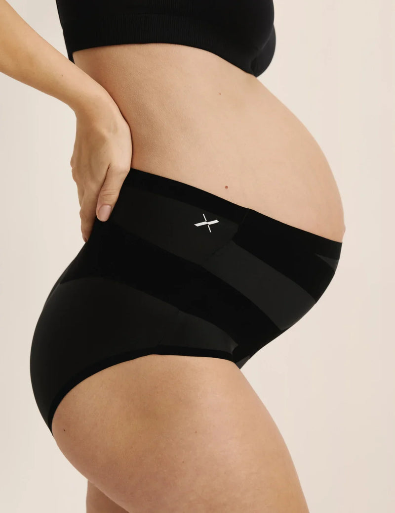 Elyse is wearing KNIX L  | Black