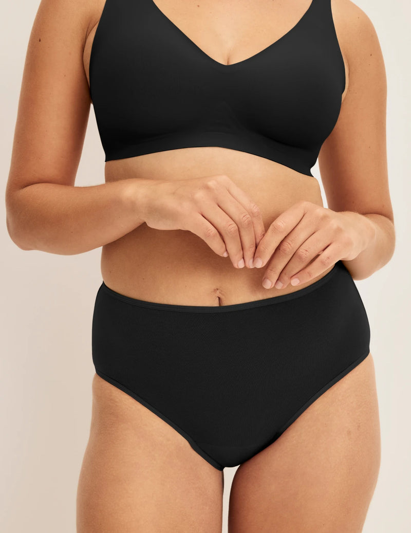 Front view of model wearing the Super Leakproof® Cotton High Rise, highlighting the coverage and fit