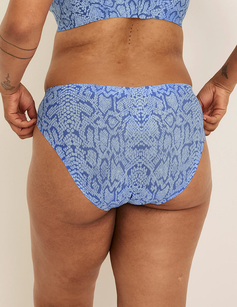 Back view of model wearing the Leakproof UltraThin No-Show Bikini highlighting the coverage and smooth fit