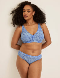 Full-body view of model wearing the Leakproof UltraThin No-Show Bikini highlighting the coverage and smooth fit