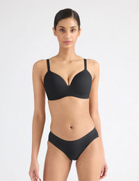 Full-body view of model wearing the Leakproof UltraThin No-Show Bikini highlighting the coverage and smooth fit