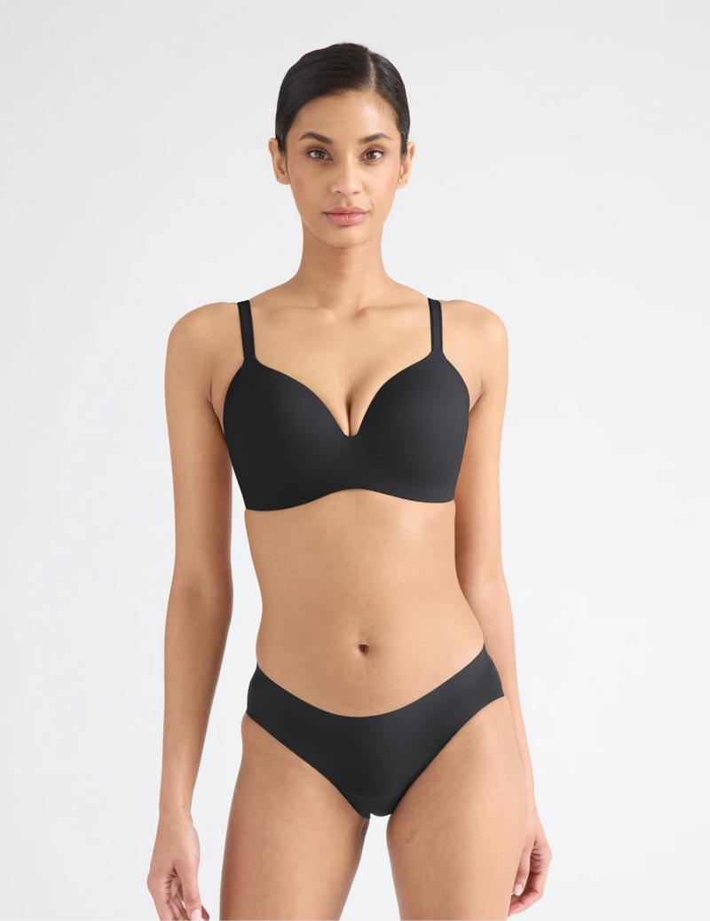Full-body view of model wearing the Leakproof UltraThin No-Show Bikini highlighting the coverage and smooth fit