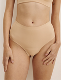 Molly has 35.5” hips, and wearing KNIX S | Warm Sand
