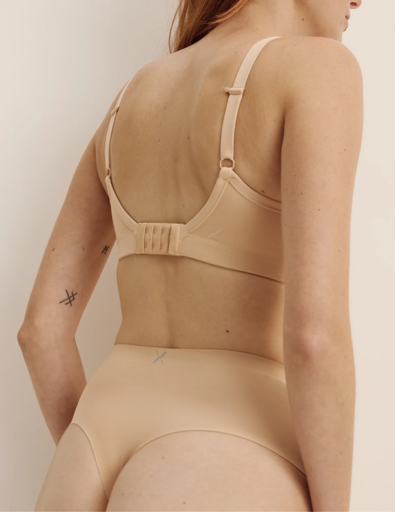 Molly has 35.5” hips, and wearing KNIX S | Warm Sand