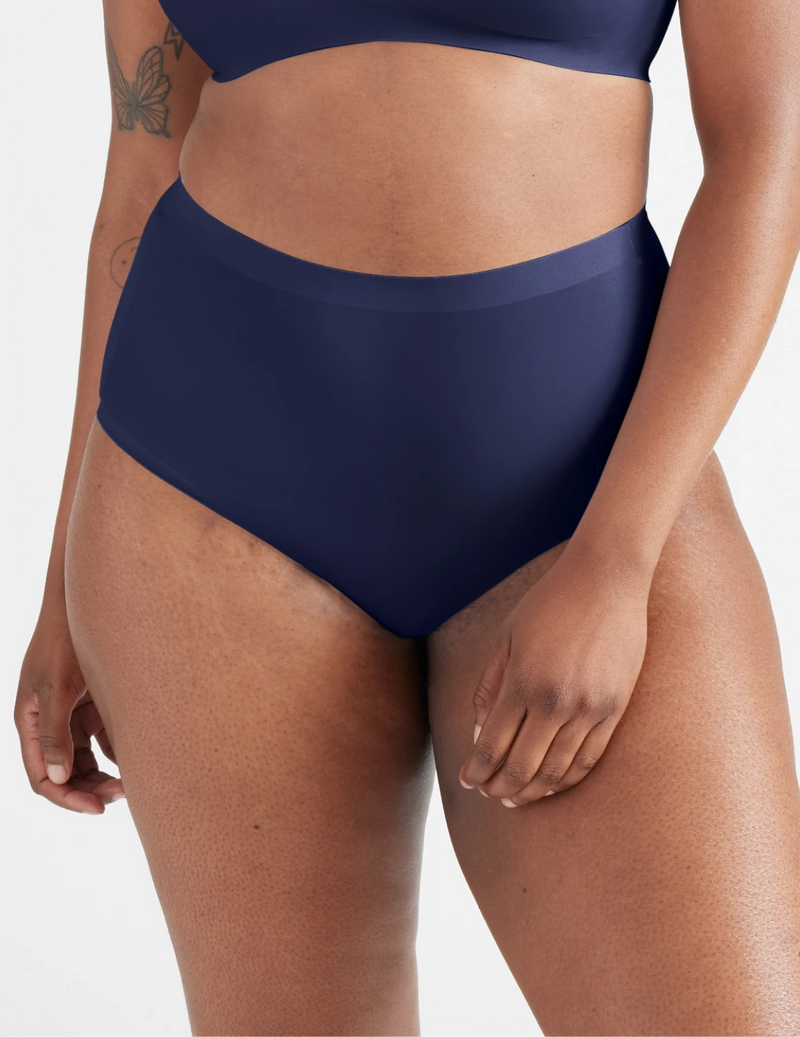 Front view of model wearing the Light Leakproof No-Show High Rise highlighting the coverage and smooth fit