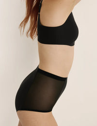 Molly has 35.5” hips, and wearing KNIX S | Black