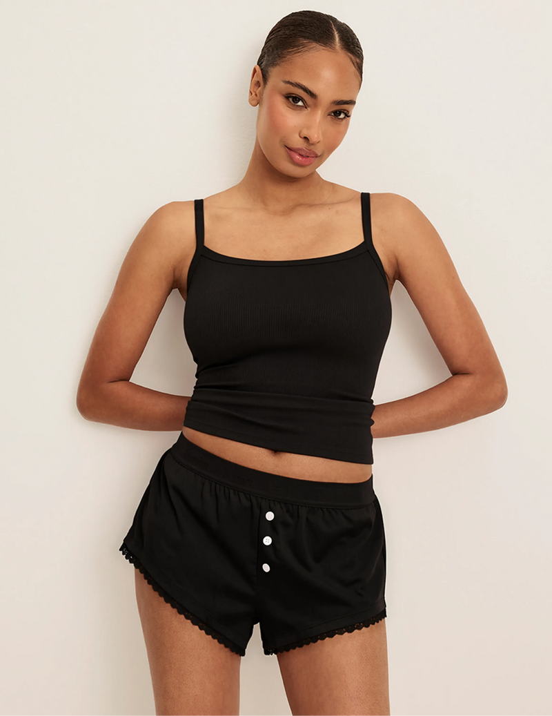 Full-body view of model wearing the Super Leakproof® Mini Dream Boxer highlighting the coverage and fit