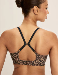 Ashley is a 32DD and wearing KNIX S+ | Cheetah Print